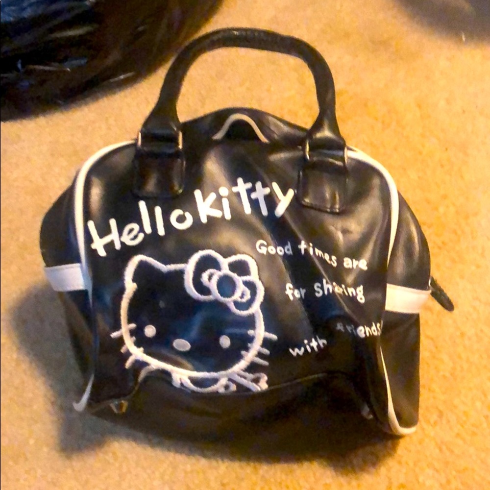 Adorable Hello Kitty bowling bag style purse.
